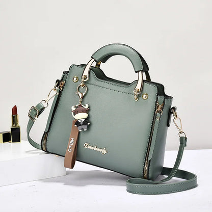 Printed monogram straddle leather bag. - Maison Novaire